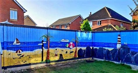 Walderslade Fence Artist Ron Williams Creates Uplifting Beach Scene Mural