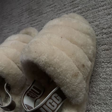 Barely worn fluffy Ugg slippers The small marks are... - Depop