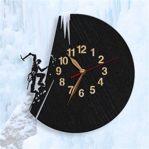 A Clock That Is On The Side Of A Mountain With Ice Behind It And Two