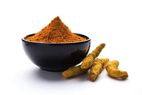 Premium Photo Dry Turmeric Dust Or Haldi Powder Also Known As Curcuma