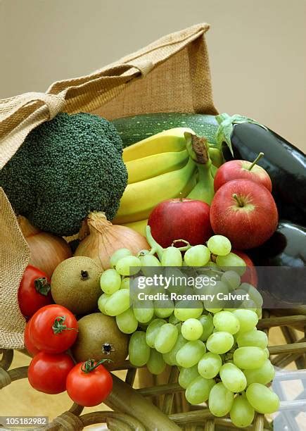 40 Groceries Spilling Out Of Bag Stock Photos High Res Pictures And