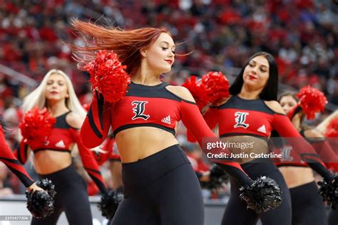 A Louisville Cardinals Cheerleader Performs During The Game Against News Photo Getty Images