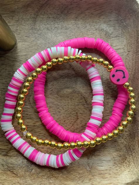 This Set Contains 2 Pink Bracelets With A Hot Pink Smiley Bracelet Diy