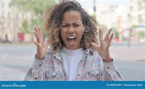 Angry African Woman Screaming In Frustration Outdoor Stock Image