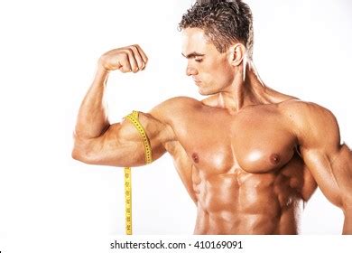 Strong Athletic Man Showing Muscular Body Stock Photo