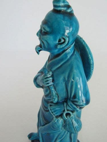 Chinese Porcelain Turquoise Glaze Figurine Man With Fish Item 1406007