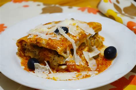 LASAGNES AU POULET PÂTE FRAÎCHE MAISON AUX DEUX SAUCES ET PARMESAN