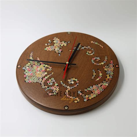 Urania Muse Colored Pencil Wood Wall Clock Henry Le Design