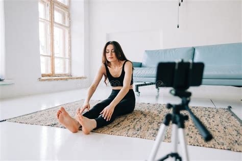 Beautiful Brunette Fitness Woman Make Stretching Exercises In Front