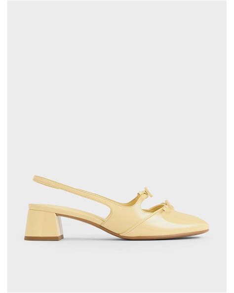 Charles Keith Dorri Double Bow Slingback Pumps In Natural Lyst