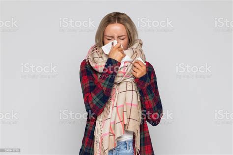 Upset Sick Woman Sneezing Or Using Napkin To Wipe Snot From Her Nose Sick Female Has Flu