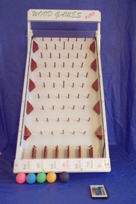 "This Tabletop Lighted Plinko Game is remote controlled and is a real attention-getter! The ...