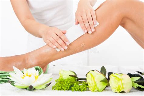 Beautician Waxing A Woman S Leg Stock Photo Image Of Health