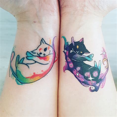 My matching cat tattoos