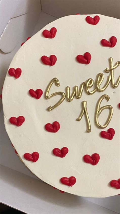 A White Cake With Red Hearts And The Words Sweet On It In Gold Lettering