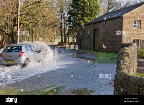 Flooding Silver Car Toyota Driving Splashing Through Deep Flood