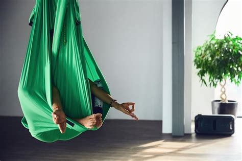 Premium Photo Aerial Different Inversion Antigravity Yoga With A Hammock