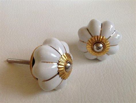 Soft White Porcelain Cabinet Knobs Drawer Pulls Gold Accents Dwyer Home Collection