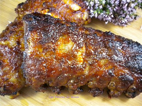 Travers de porc spare ribs caramélisés au four ou au barbecue Les