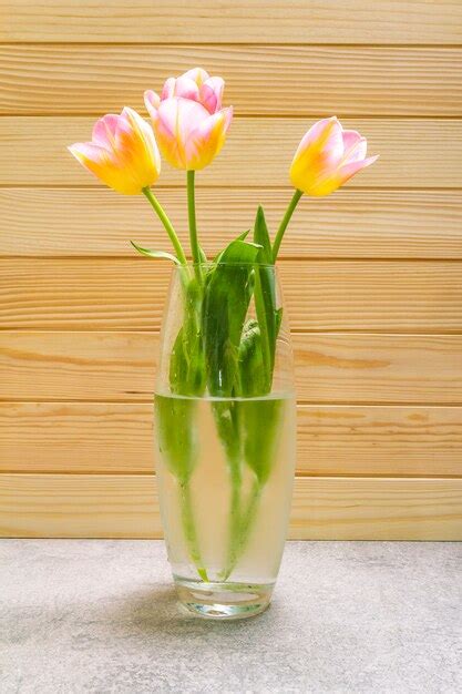 Premium Photo Beautiful Tulip Flowers In A Vase