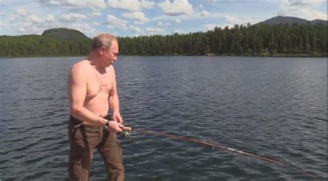 Russian President Putin Seen Spear Fishing In Siberia