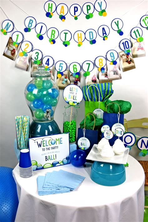 Let's Have A Ball! Ball Party Decorations | Ball theme party, Simple birthday party, 1st ...