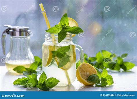 Mojito Cocktail Or Mocktail With Lemon Mint And Ice Honey In Glass Jar Summer Cold Alcoholic