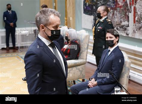 Prime Minister Justin Trudeau Right Looks On As Seamus Oregan