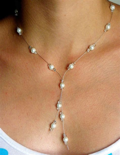 Collier mariage décolleté perles ivoire et transparentes Collier par