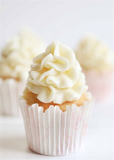 Vanilla Cupcakes With Raspberry Filling And Cream Cheese Frosting I Am Baker