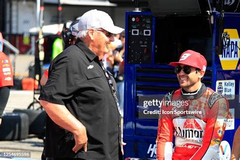 Rick Hendrick Talks With Chase Elliott On Pit Road During Qualifying