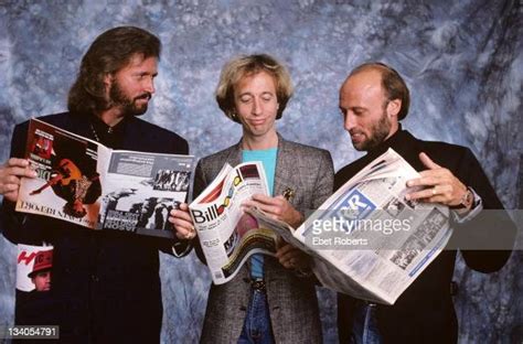 The Bee Gees Posed Together Reading Music Trade Magazines In New York