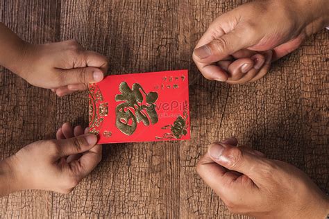 Hand For Handing Out Red Envelopes Picture And Hd Photos Free