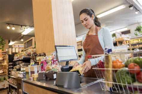 Cashier Working At A Food Market Worklife Law