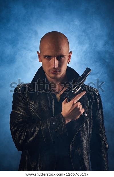 Bald Man Leather Jacket Revolver Pistol Stock Photo 1265765137