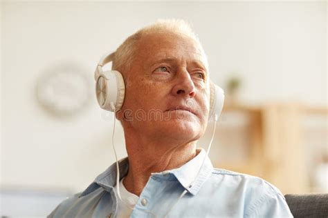 Pensive Senior Man Listening To Music Stock Image Image Of Pensioner