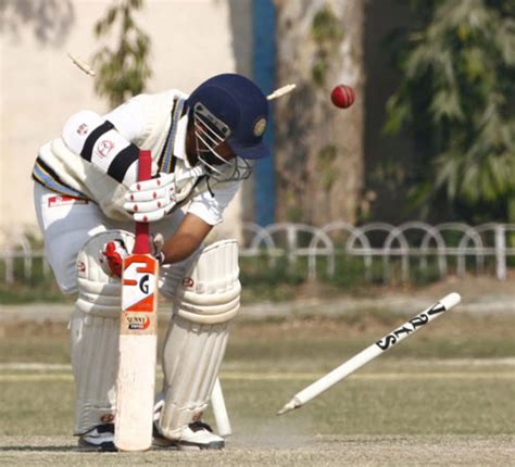 Gujarat S Parthiv Patel Raises His Bat On Reaching His Fifty