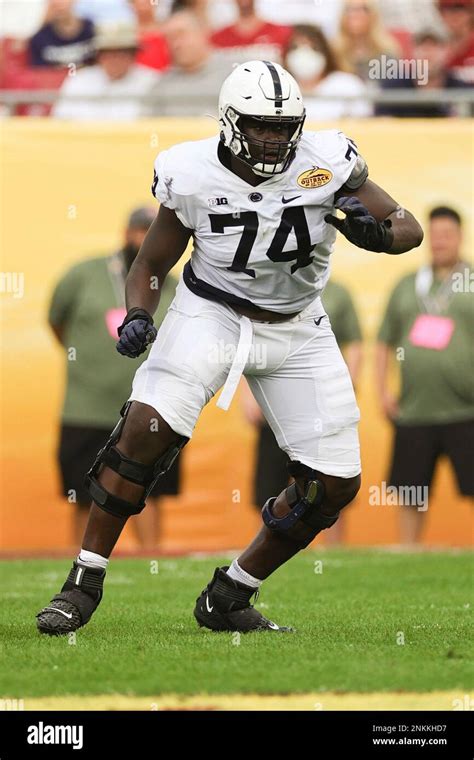 Penn State Offensive Lineman Olumuyiwa Fashanu Blocks A Defender