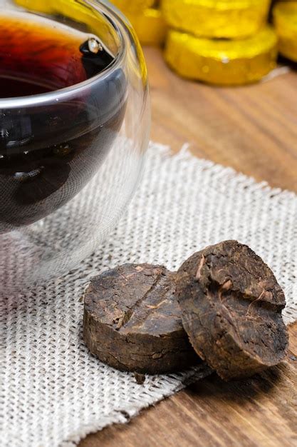 Premium Photo Chinese Pressed Fermented Puerh Black Tea Closeup