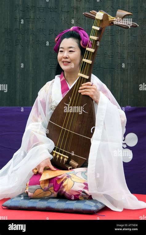 Biwa Player At Yushima Tenjin Ume Matsuri Japanese Apricot Blossom