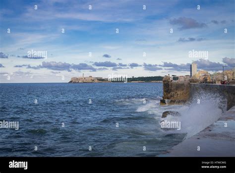 Waves Crashing Against The Wall Of El Malecon Havana Cuba Stock