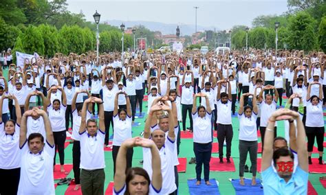 Jaipur People Perform Yoga During A Session On The International