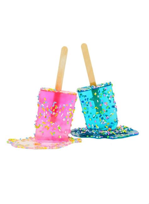 Two Ice Cream Cones With Sprinkles On Them