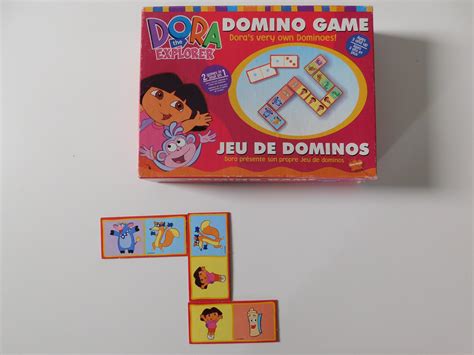 Domino Dora Au Pays De Dinou