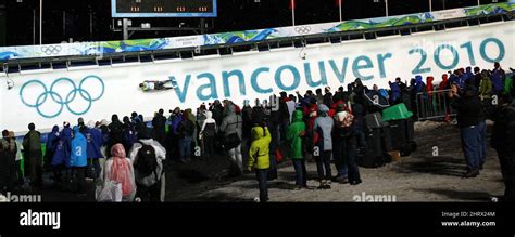 Spectators Watch Germanys Andi Langenhan During The Second Run Of Men