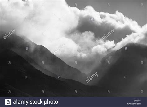 Black and white image over scenic mountains Stock Photo - Alamy