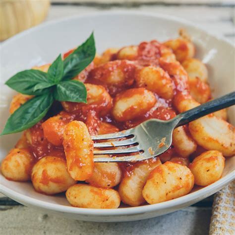 Oquis Con Salsa De Tomate