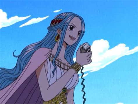 A Woman With Long Blue Hair Holding A Cell Phone In Her Hand And