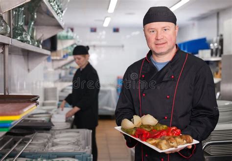 Chef Presenting Cooked Dish Stock Photo Image Of Enjoying Woman