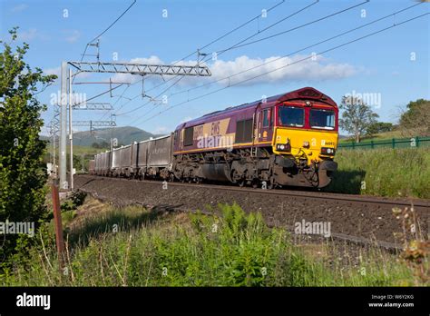 Db Cargo Class 66 Locomotive In Ews Livery Passing Lambrigg North Of Oxenhome On The West Coast